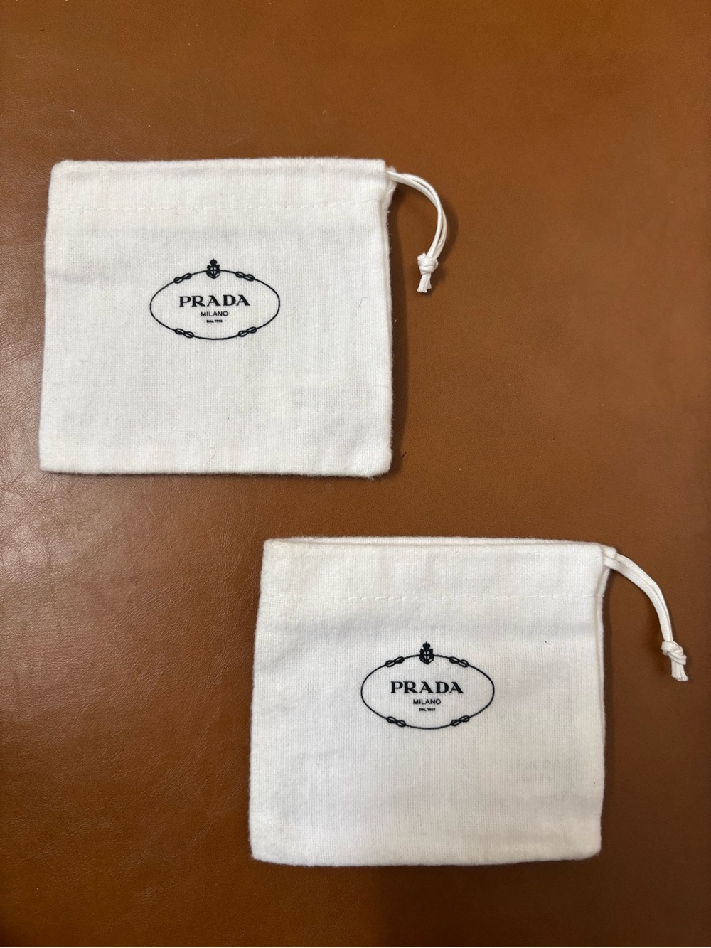 Prada White Drawstring Pouches with Black Logo - Set of 2